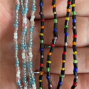 OHM-Made by Lo, TRANS PRIDE and RAINBOW PRIDE bracelets. Each sold separately.